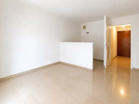 Le séjour de l’appartement · photographie réelle
